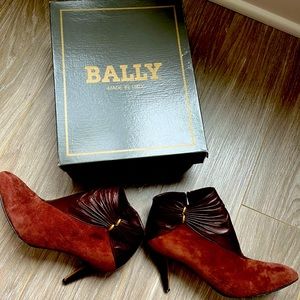 Rich brown leather and suede shoe boots with gold accents.